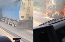 Carreta carregada com bebidas é destruída por incêndio na BR-364, na “Curva da Morte”