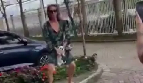 Mulher é presa após ser filmada sacudindo cachorro em condomínio no Recreio