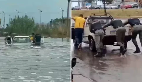 Policiais entram em enchente e resgatam casal preso dentro de carro em Goiás