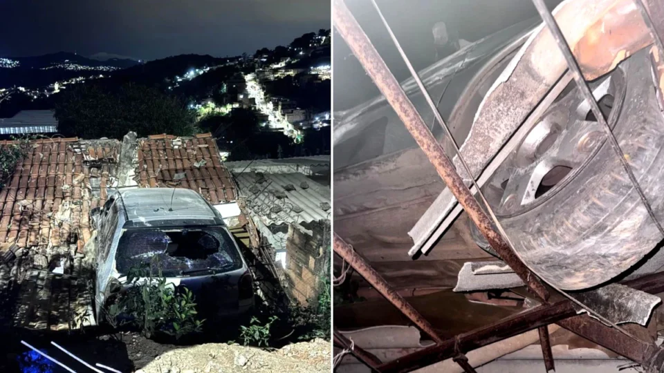 Carro bate em muro e fica pendurado sobre telhado de casa na Grande BH