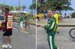 Homem negro aparece acorrentado durante ato de apoio a Flávio Bolsonaro no Rio